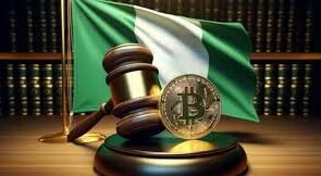 A picture of the Gavel with a coin with the bitcoin symbol against the Nigerian Flag