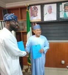 An image of the managing director of BOA, Mr. Ayo Sotinrin and another distinguished man
