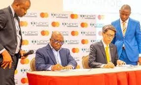 NPDC and MasterCard representatives signing the MoU