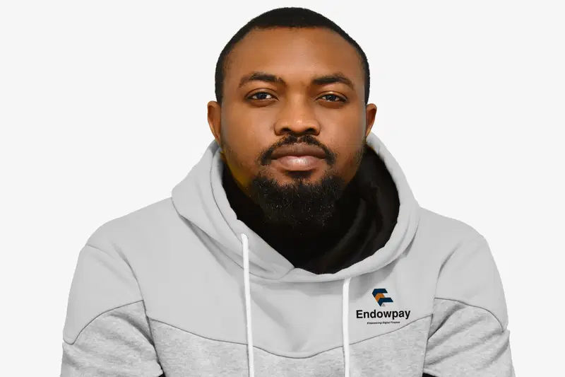 An image of a man wearing a Endowpay hoodie shirt