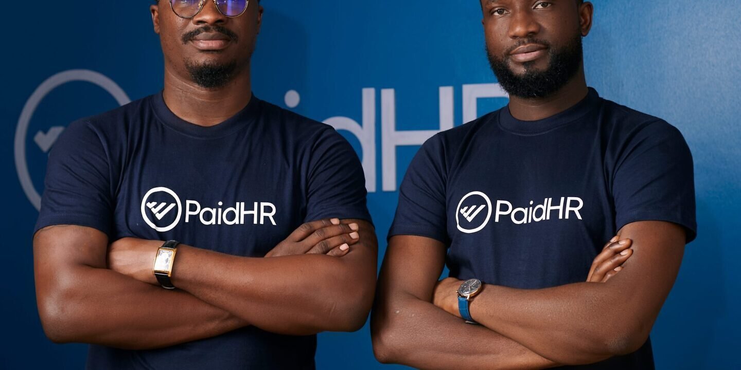 An image of two men wearing PaidHR vest