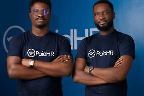 An image of two men wearing PaidHR vest