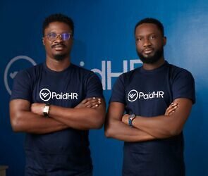 An image of two men wearing PaidHR vest