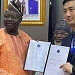 Nigerian and Chinese national signing the MoU