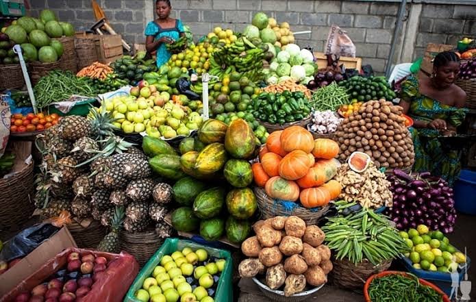 An image displaying vegetable sellers.