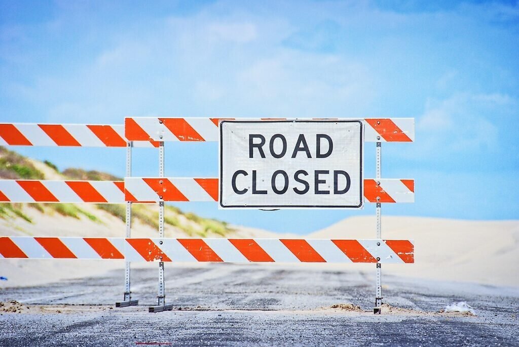 A road closed sign