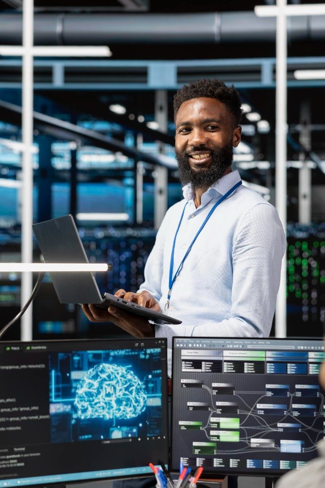 A man holding a laptop and a AI system