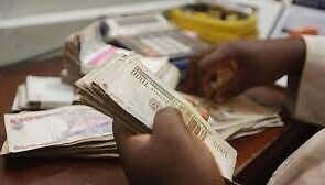 Someone holding cash
